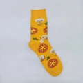Close-up of yellow mid-calf cotton socks with realistic tomato and mushroom jacquard patterns - One Size / Tomato Vegetable