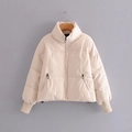 Short beige padded jacket with stand collar and side zip pockets on a hanger - XS / Tops / Off White