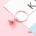 Pink resin bell keychain with matching metal round ring accessory for bags and keys - Pink