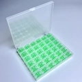 36 Green Bobbins In A 36-compartment Box / Shuttle Core Storage Box