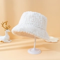 White plush bucket hat with textured striped faux fur fabric for winter warmth - White