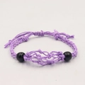 Handmade purple woven net bracelet with black beads and adjustable knot closure - Bracelet / Purple