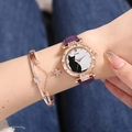 Close-up of purple leather watch with cat pattern and matching star charm bracelet - Purple + Bracelet