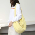 Minimalist cream yellow nylon crescent crossbody bag with adjustable wide strap for daily use - Yellow