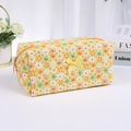 Yellow floral makeup bag with cute bow decoration and golden zipper for travel storage - With Bow / Yellow Sunflower