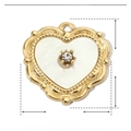 Detail view of heart-shaped shell pendant with stainless steel frame and crystal - YE449 Heart Gold Shell with Rhinestone