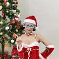 Silver glittery 2025 novelty glasses paired with a festive red velvet Christmas costume - Silver Long 2025 Glasses