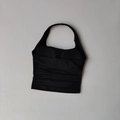 Detail of black halter sports vest with ruched chest design and high-stretch fabric - Black