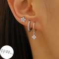 Silver star and moon earring set with cubic zirconia shown on model ear - Silver Flower Zirconia Earring 3-Pair Set / White Gold