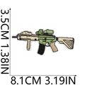 Macro shot of rifle embroidery patch with dimensions 3.5cm by 8.1cm in military green - Tactical Carbine (No. 14)