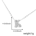 Detail view of silver letter K pendant with white zircons including size measurements - Silver Letter-K