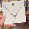 Silver titanium steel necklace with a water drop crystal pendant on a cross chain - X096 Silver Teardrop Zirconia