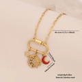 Golden stainless steel celestial necklace featuring sun, moon and star charms with crystals - Star and Moon Style (1#星月)