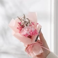 Handcrafted mini bouquet with pink carnation and gypsophila in matte pink gift wrap - Light Pink Carnation Pink Paper