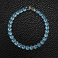 Detail view of hip hop tennis bracelet with blue square-cut zircons on black leather - 5mm-16cm / Sky Blue Zirconia