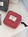 Quilted heart red plaid sanitary pad pouch with zipper closure and black tassel detail - Red
