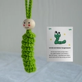 Handmade green knitted worry worm with wooden head and German message card gift - Green Lucky Worm