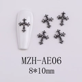 Macro detail of 8x10mm gunmetal gothic cross nail charms with embossed metal texture - Embossed Cross (AE06)