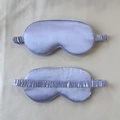 Pale purple satin sleep mask with elastic strap shown from both sides for soft comfort - Taro