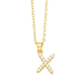 Close-up of golden X-shaped pendant necklace featuring detailed white pearl inlay - Gold Letter X