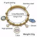 Gold stainless steel cable bracelet with evil eye and Fatima hand charms in five pendants - G-Gold Blue Hamsa Style
