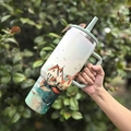 Insulated stainless steel tumbler with handle and scenic nature illustration in light green - 40oz / Lakeside Castle