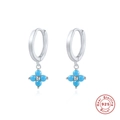 Macro detail of S925 sterling silver hoop earrings with blue snowflake flower charms - Silver with Blue Turquoise