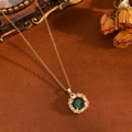 Detail of vintage gold necklace featuring a large green stone and zircon halo - Gold Rounded Square Green Zirconia Necklace(T031)