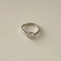 Adjustable silver ring with large round solitaire gem and small side cubic zirconia stones - Round Clear Main Stone with Side Accents Style (MY32756)