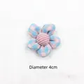 Close-up of 4cm pink and blue plaid fabric flower accessory with corduroy center - Pink Blue Plaid Flower