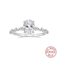 Macro detail of S925 sterling silver ring with oval and pear shaped zircon stones - Size 7 / Oval Three-stone Style / Silver