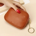 Brown genuine leather mini coin purse with lychee texture and golden keychain hook - Brown