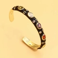 Gold-plated cuff bracelet with black enamel finish and multi-colored zircon stones - Black