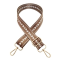 Detailed view of adjustable nylon bag strap with brown and white arrow pattern and gold hooks - Camel Silver Buckle