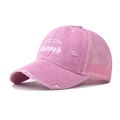 Detailed side view of pink distressed mesh baseball cap with white blessed print - Pink