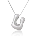Polished silver U-shaped alphabet pendant with a Venetian box chain on white background - Letter U