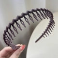Nonslip wavy matte dark brown headband with teeth for securing hair stylishly - Brown