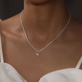 Elegant silver clavicle necklace with a sparkling heart zircon pendant on a model - Silver Heart Sparkling Rhinestone Fine Necklace
