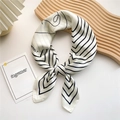 Silk-like small square scarf with black geometric V-pattern and ARTFELT typography - Geometric Line Black