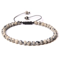 Adjustable 4mm Dalmatian Stone beaded bracelet with black woven cord for yoga style - Spotted Stone