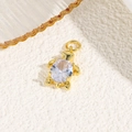 Macro view of gold turtle pendant with an oval faceted gemstone for jewelry making - Clear (Turtle Style A)