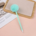 Close-up of a mint green plush pom pom ball pen on a pink desk with ins-style props - 0.5mm / Cyan Blue