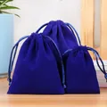 Three royal blue velvet drawstring jewelry pouches in small, medium, and large sizes - Blue
