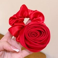 Elegant red satin rose flower hair scrunchie with a glossy silk-like texture finish - Red