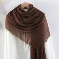 Dark brown pleated cotton linen scarf with frayed edges displayed on white shirt - Dark Brown