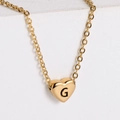 Minimalist 18k gold plated heart necklace featuring a black letter G pendant on a chain - Letter G