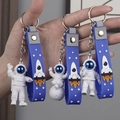Astronaut keychains with silicone wristbands in three different space poses - No.2 Blue 3-Piece Keychain Set (Blue Strap)