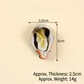 Realistic artificial oyster food model keychain with ivory shell and brown oyster meat - Sauced Oyster - No Hook
