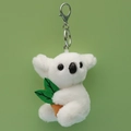 White plush koala keychain holding an orange carrot with a silver metal hook - White with Leaf