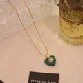 Collana cuore in malachite verde con ciondolo a stella zircone su catena dorata - Malachite